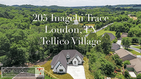 picture of home located at 205 Inagehi Trace Loudon TN in Tellico Village with Tennessee hills in background